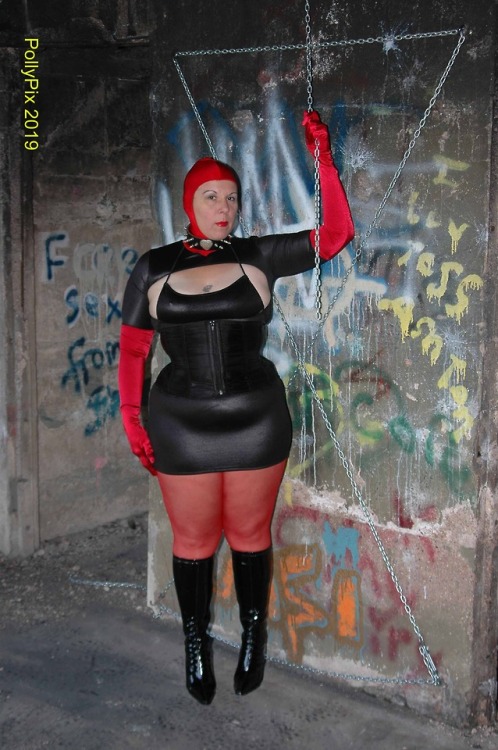 Polly in black and red spandex.