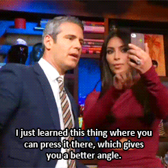 bricesander:  Kim Kardashian teaches Andy Cohen the art of the selfie. 
