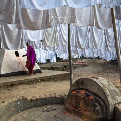 Hindu shrines among the hotel towel drying in Dhobi Chour in Kathmandu.#kathmandu #nepal #dhobicho