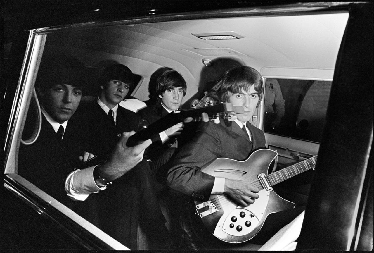 soundsof71:  The Beatles in their limo with guitars, 1964, by Curt Gunther