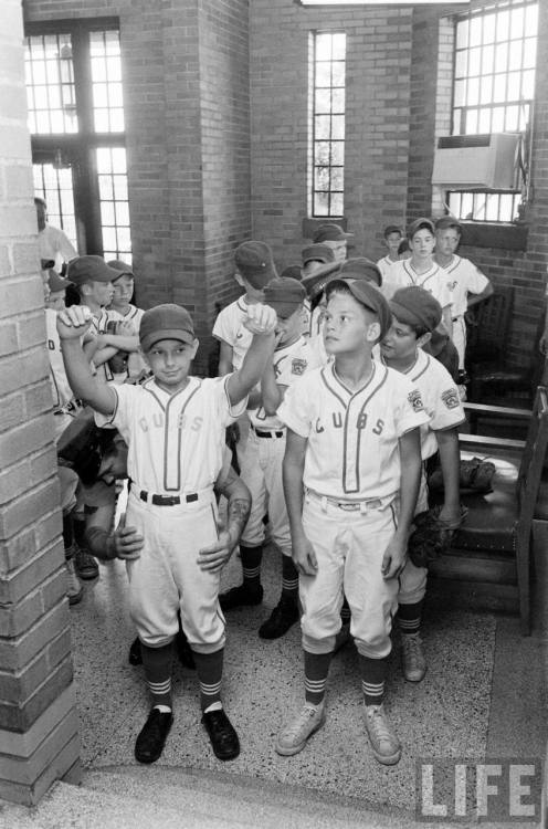 Little League teams searched before entering the penitentiary (Francis Miller. 1961)
