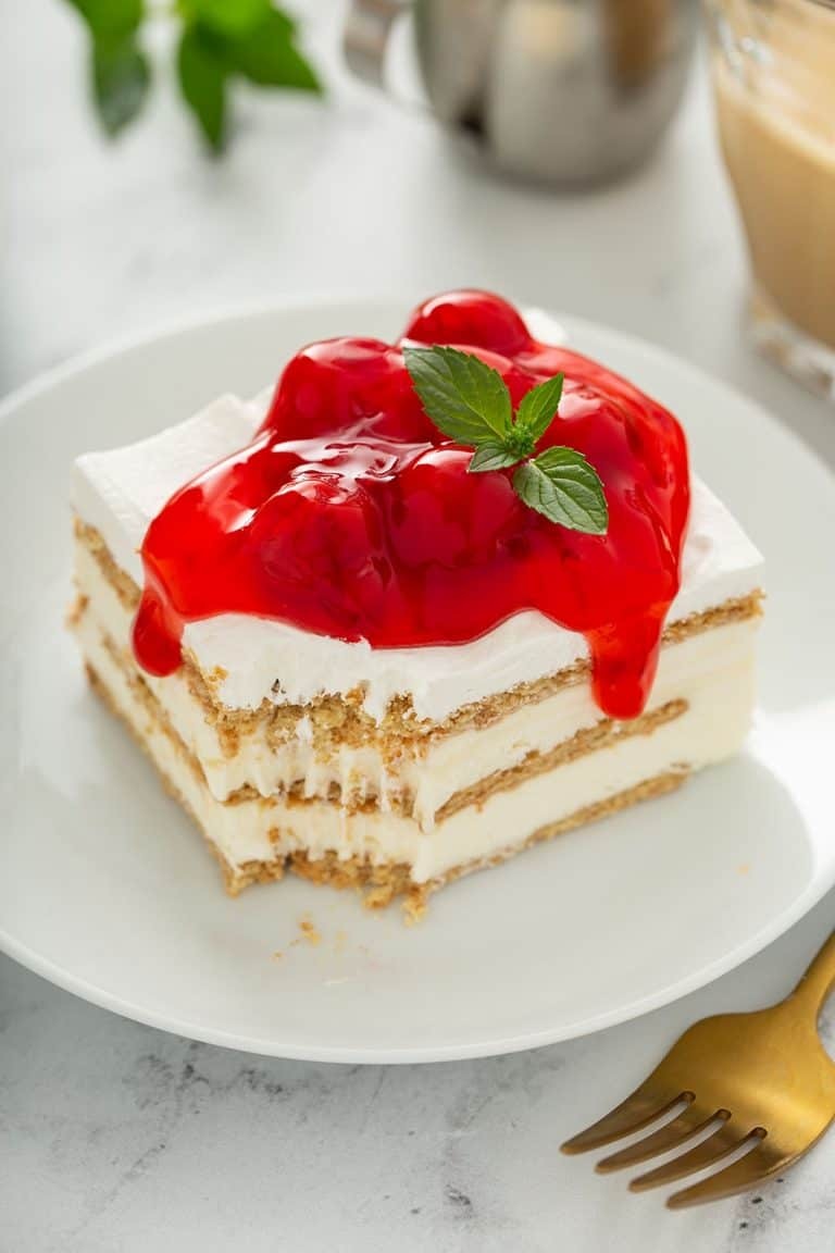 No-Bake Cheesecake Eclair Cake - Sweet Tooth Girl