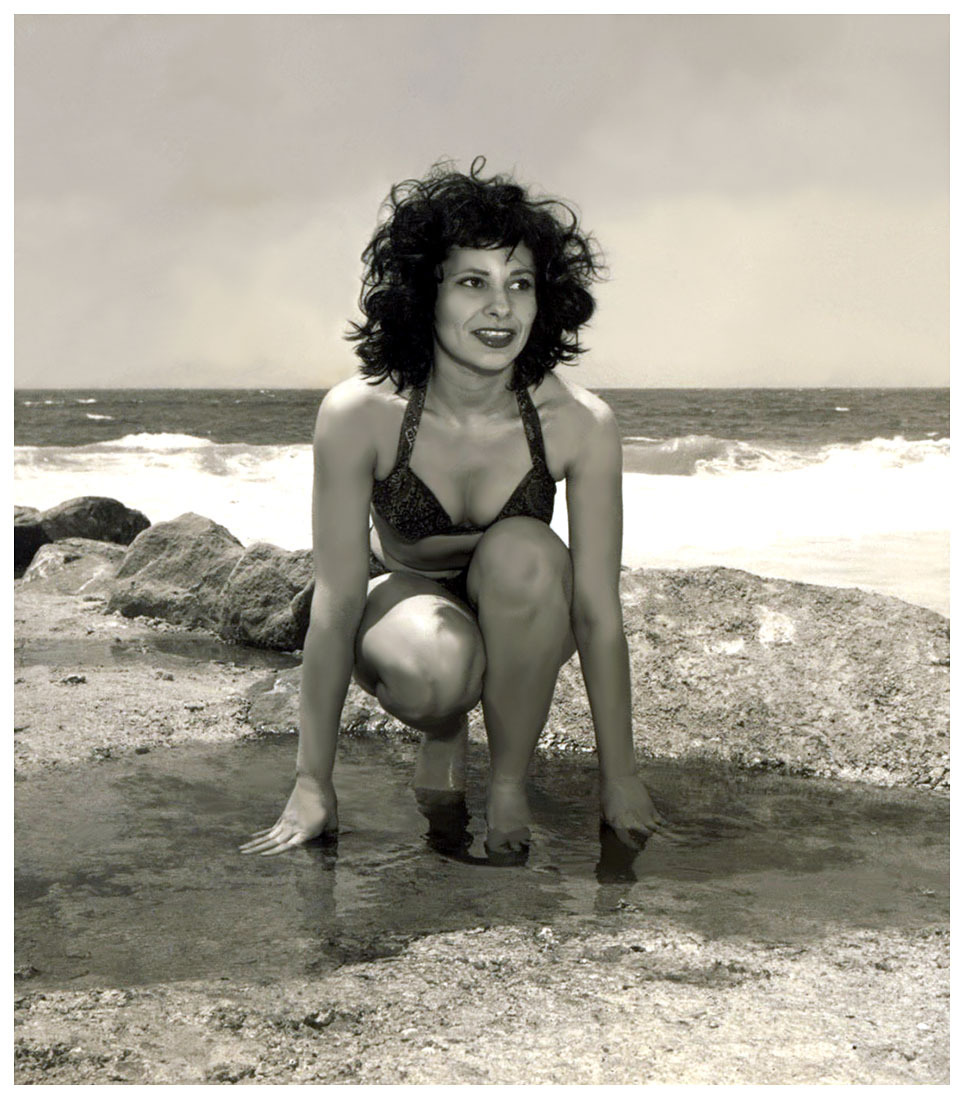 Patti Waggin poses in a tidal pool..   Scanned (and cleaned) from a contact print
