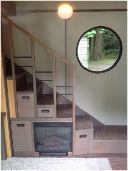 tinyhousedarling:  micromanor:  Hand Built Luxury Tiny House has Fireplace built into stairs and Jacuzzi Bath and Shower for sale.  Yes please!! 
