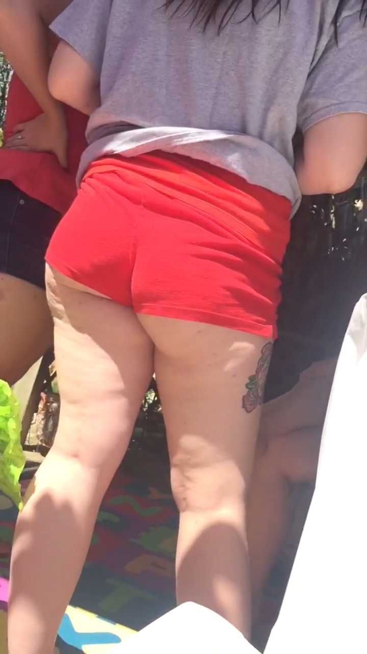 teenasscreeper:  Teen with her ass hanging out her shorts! Big booty slut! Go watch