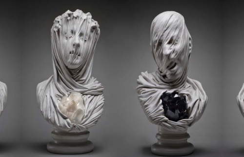 asylum-art:  The Veiled Ghosts of  Livio Scarpella The work of Italian contemporary artist Livio Scarpella turns good and evil into delicacy.  This group of sculptures, named “Ghosts Underground”, depicts lost souls anguishing beneath the effect