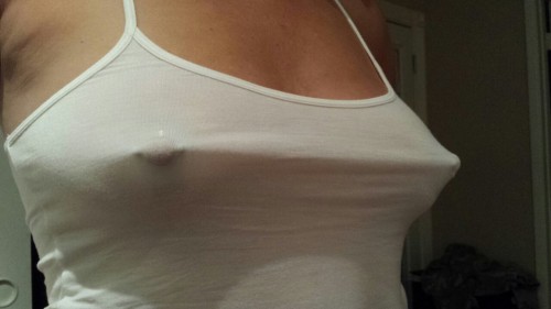 scottnikipowers:  Niki with her nipple stretchers on with a very thin tank top on!