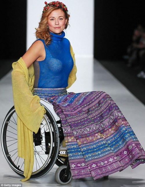 disabilityhistory:  Breaking down barriers: Russian designers present catwalk collections on disabled models at Moscow Fashion Week Image description: Three photos of disabled models on a catwalk: a little woman in black and white with a fierce pose,