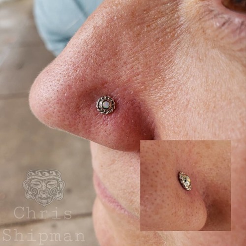 Holy healed piercings batman! That piercing is healed! Adorned with a beautiful 14k white gold mini 