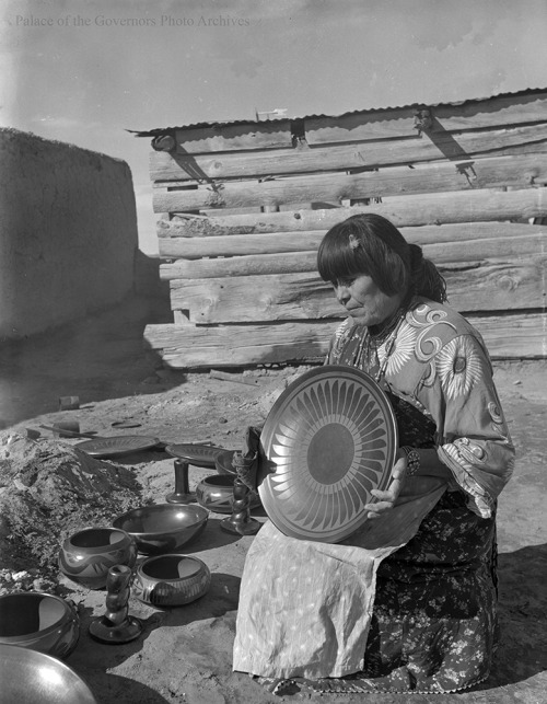 pogphotoarchives: Maria Martinez holding finished pottery, San Ildefonso Pueblo, New MexicoPhotograp