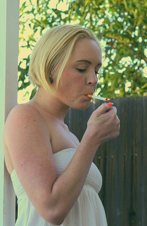 al8675309: Smoking cutie! From Shesmokes.com