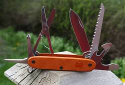 sakitup:  Here is some sweet orange HAIII with black screws. Farmer + scissors + Phillips configuration