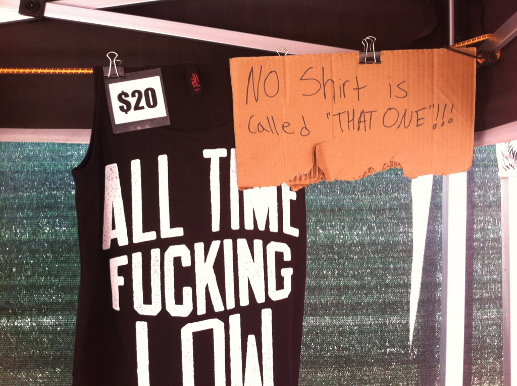 wetdreamsonlylastforanight:  Vinny’s sassy merch table signs; Warped 2012