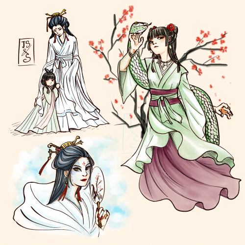 White Snake Mama And Her Green Gremlin Snake Baby For The Year Of The Snake 