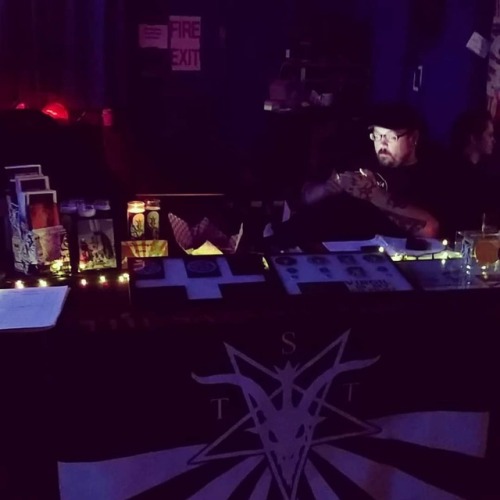 Hard at work at the best merch table you&rsquo;ve ever seen. #MerchLife #TSTAZ #TheSatanicTempleAriz