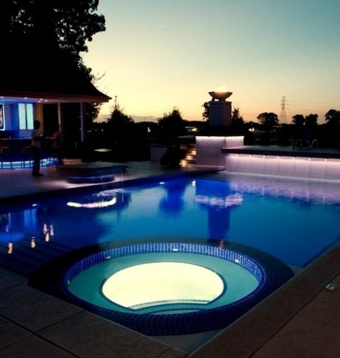 Hot Tub Pool Cedar RapidsLarge Contemporary Courtyard With A Rectangular Hot Tub And Stamped Concrete