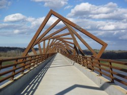 ombuarchitecture:  Iowa High Trestle Bridge Spanning between the two rural communities of Woodward and Madrid, the Iowa High Trestle Bridge connects 25 miles of High Trestle Trail.. (read more) Architect: RDG Planning &amp; Design Location: Woodward and