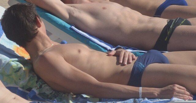 speedomatt:  Swim team getting some sun between practices over spring break Coach