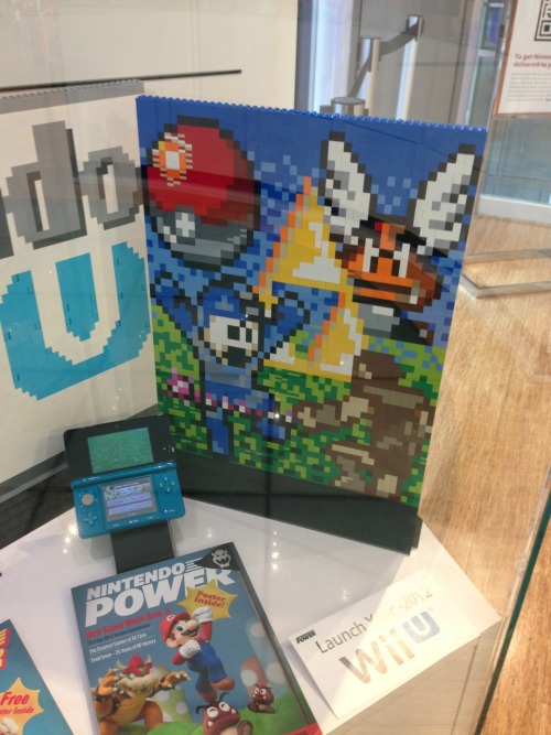 kidclimax:Stuff at the Nintendo world store in NYC, including a game boy that survived the gulf war.
