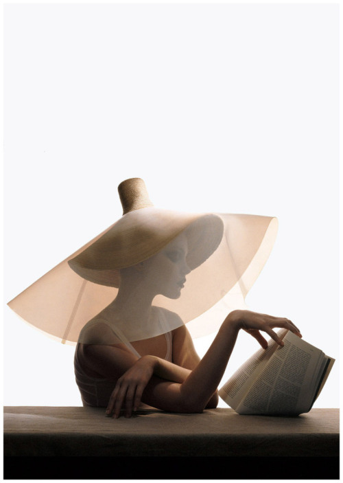 Jessica Stam, Yohji Yamamoto straw hat with clear plastic overlayVogue 2004Photo Irving Penn