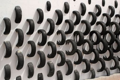 unconsumption:  junkculture:  New Salvaged Tires Installation Breaks the Homogeneity of the Urban En
