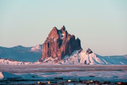 cybergata:  Shiprock in Northwestern New Mexico, after the storm by  Kevin Bartlett.The Navajo name is Tsé Bitʼaʼí, “rock with wings”  