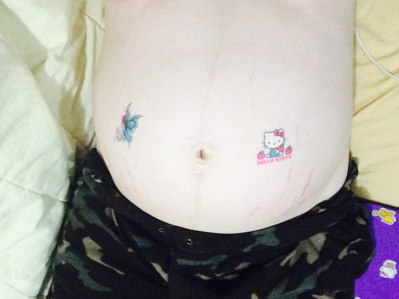 daddysbabydollxx:  Temporary tattoos on my belly 