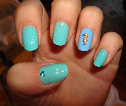 I love my palm tree/seahorse mani! I used some popping pastels & Hex nail jewelry. 