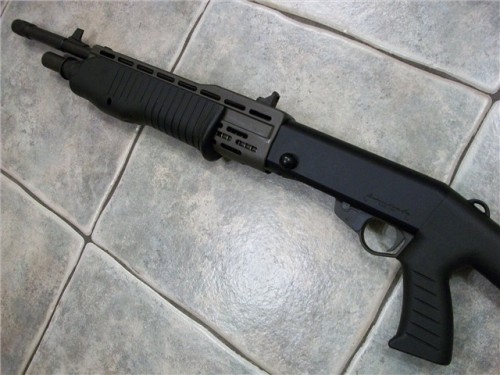 gunrunnerhell:  SPAS-12 Probably one of the most famous shotguns in pop culture thanks to Hollywood and the video game industry. The stereotypical SPAS-12 image is the one with the large folding metal stock and hook, but it did have variations. This one