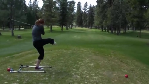 RBK amputee with converse shoe on her only leg plaing golf