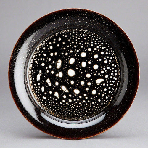 ortut:Brother Thomas Bezanson1. Plate, crackle glaze with tenmoku2. Decorative plate, textured black