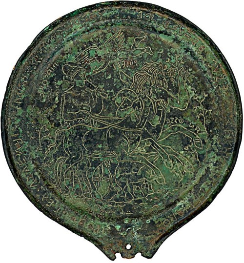 archaicwonder:The Icarius Mirror, written in Etruscan on bronze from Etruria, Italy, 6th Century BCT