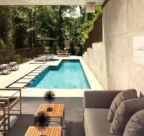 New York Pool Pool HouseExample Of A Mid-sized Trendy Backyard Concrete Paver And Rectangular Lap Pool