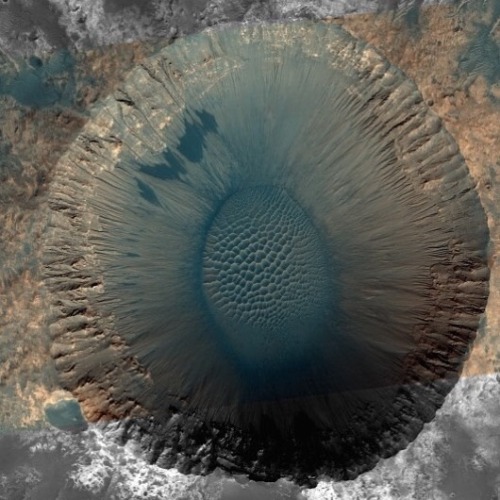 A Martian crater (Meridiani Planum) and an iris post iridectomy