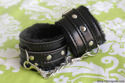 thebarkingfoxx:  bdsmgeekshop:  Leather Fuzzy Cuffs in Black  Love these! :D