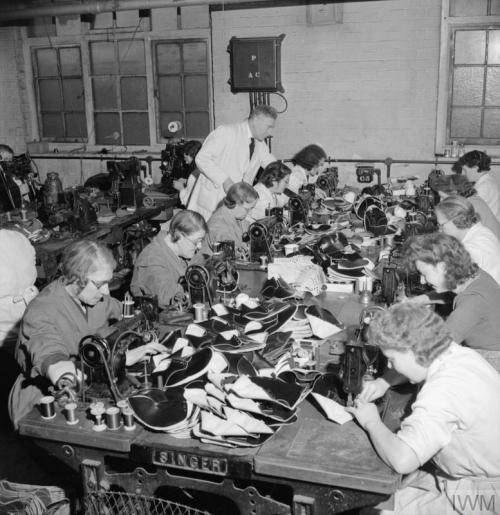 The manufacture of footwear for the Women&rsquo;s Royal Naval Service at afactory in the Midlands (E