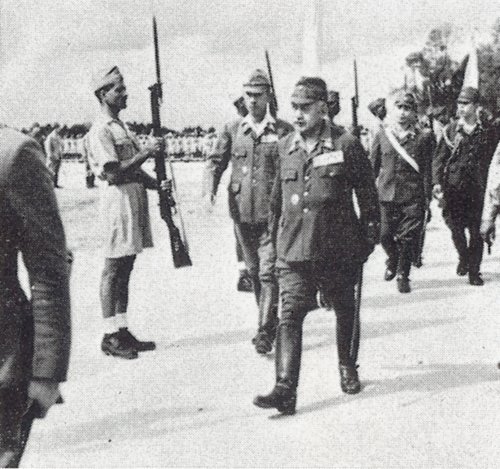 ww2inpictures:  Japanese General Kenji Doihara inspects soldiers of the Indian National Army. The IN