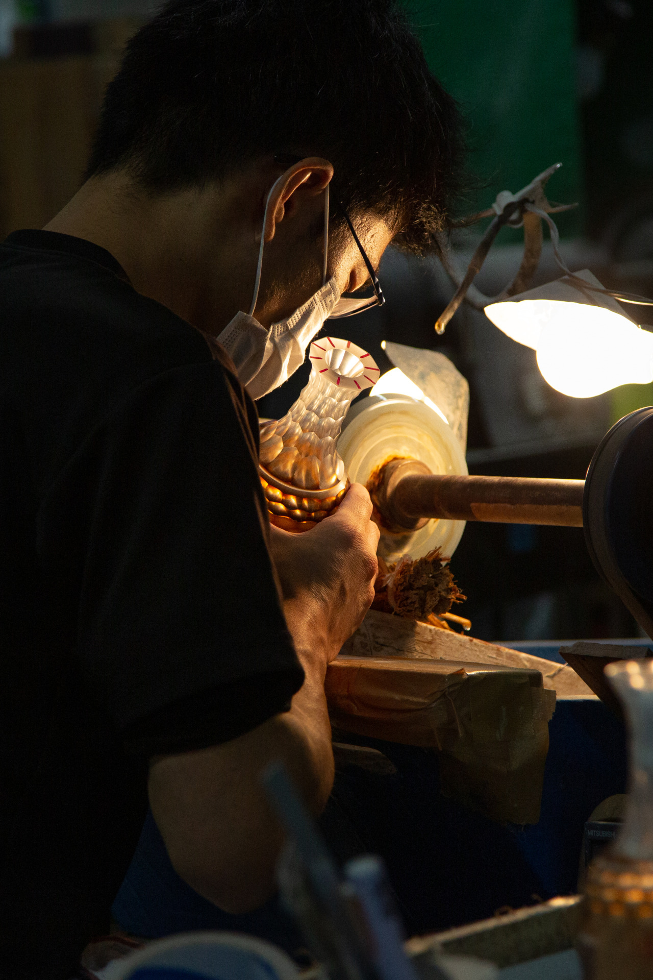 <p><b>Artist grinding the design into a crystal vase</b><br/></p><p>Satsuma Kiriko Crystal Factory in Kagoshima. I love doing people at work themed photography.<br/></p>