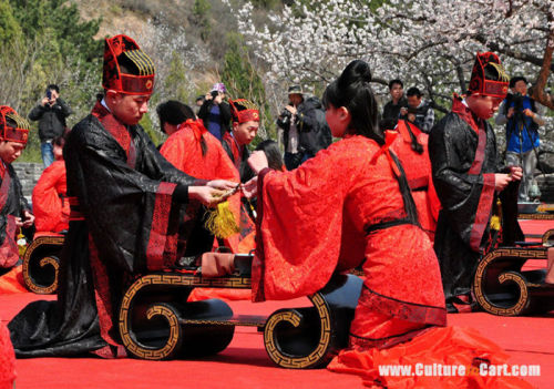  On April 11, the two came together as 21 married couples celebrated a traditional Chinese wedding c