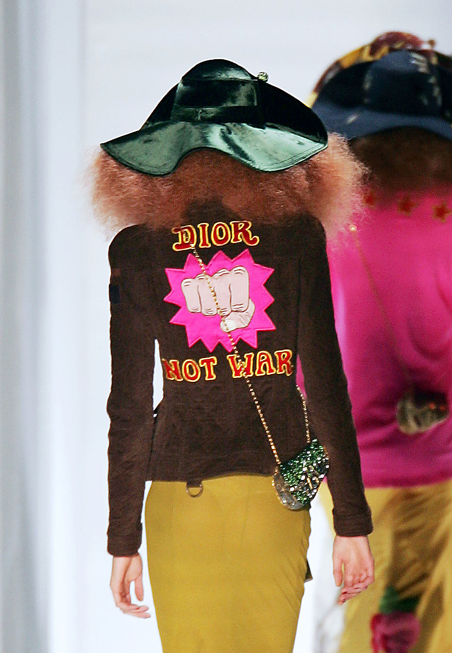 John Galliano for Christian Dior made an anti-war statement on the spring 2005 runway “Dior Not War”