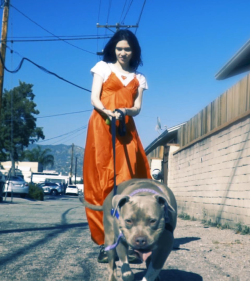 thatlook:   Grimes with her dog Q.