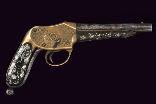 An interesting engraved and decorated martini single shot pistol. I’m not sure what the proven