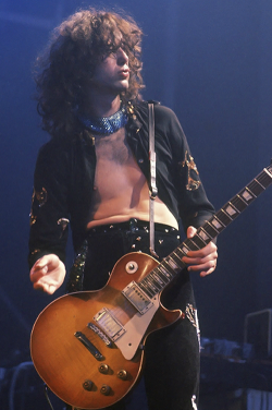 babeimgonnaleaveu:Jimmy Page performing on