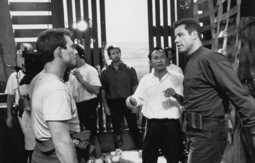  Christian Slater, John Woo and John Travolta on the set of Broken Arrow. 