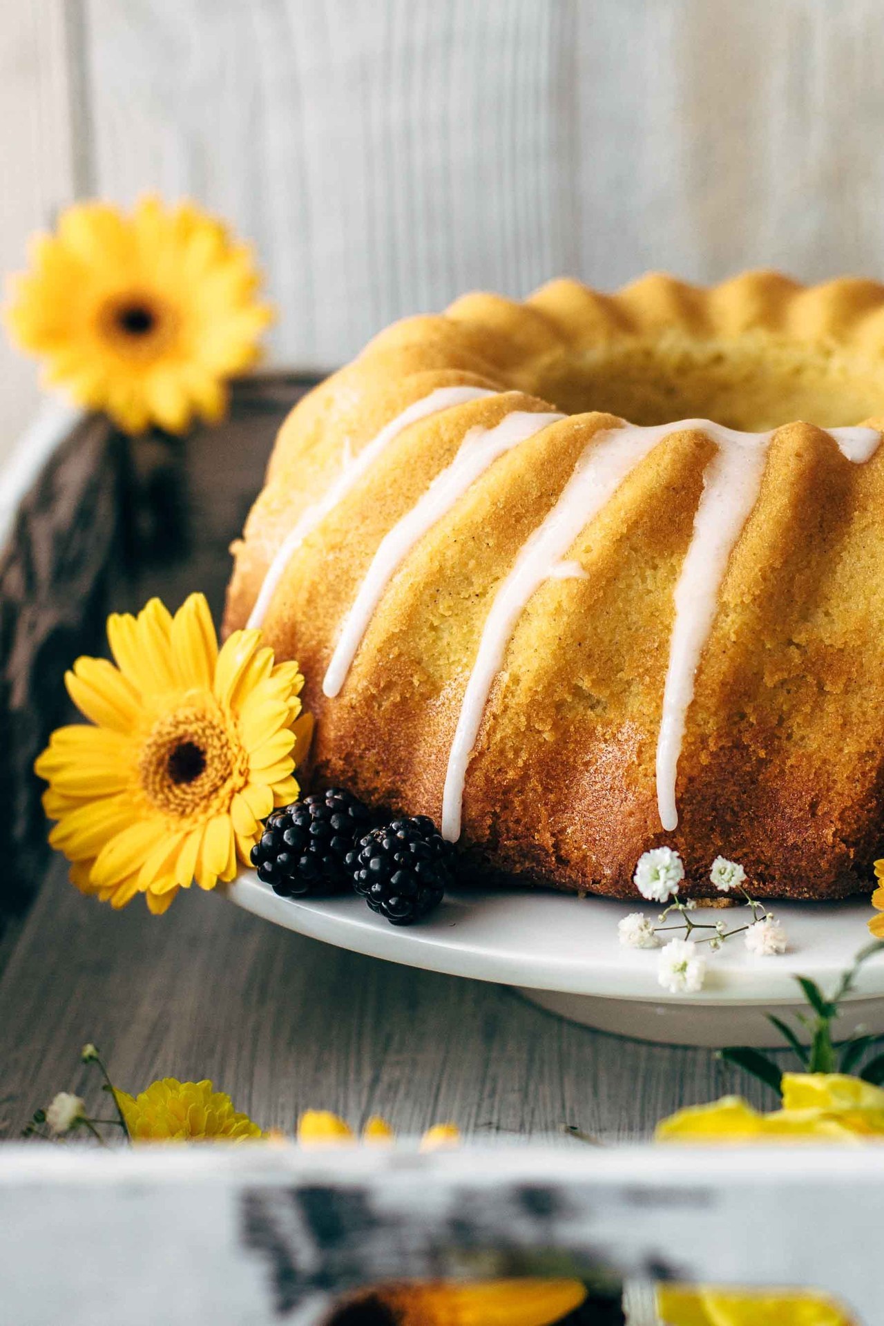 CREAM CHEESE SWIRLED LEMON BUNDT CAKE - Sweet Tooth Girl