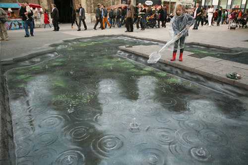 unknowngenre: 3D Pavement Drawings by Julian Beever Anamorphic illusions are drawn in a special dist