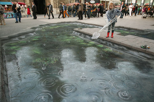 unknowngenre:  3D Pavement Drawings by Julian Beever  Anamorphic illusions are drawn in a special distortion in order to create an impression of 3 dimensions when seen from one particular viewpoint.  more 