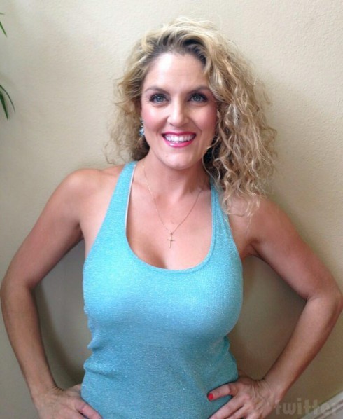 sandyclawsx:  dont know why but her dumb face makes me hard as fuck, the huge tits