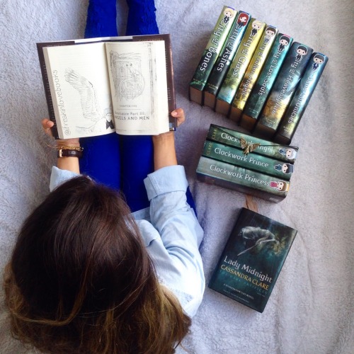ifreakinlovebooks:Just me chilling with some of the loves of my life
