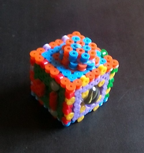 Fidget cube made from perler beads, with this tutorial [ x ]